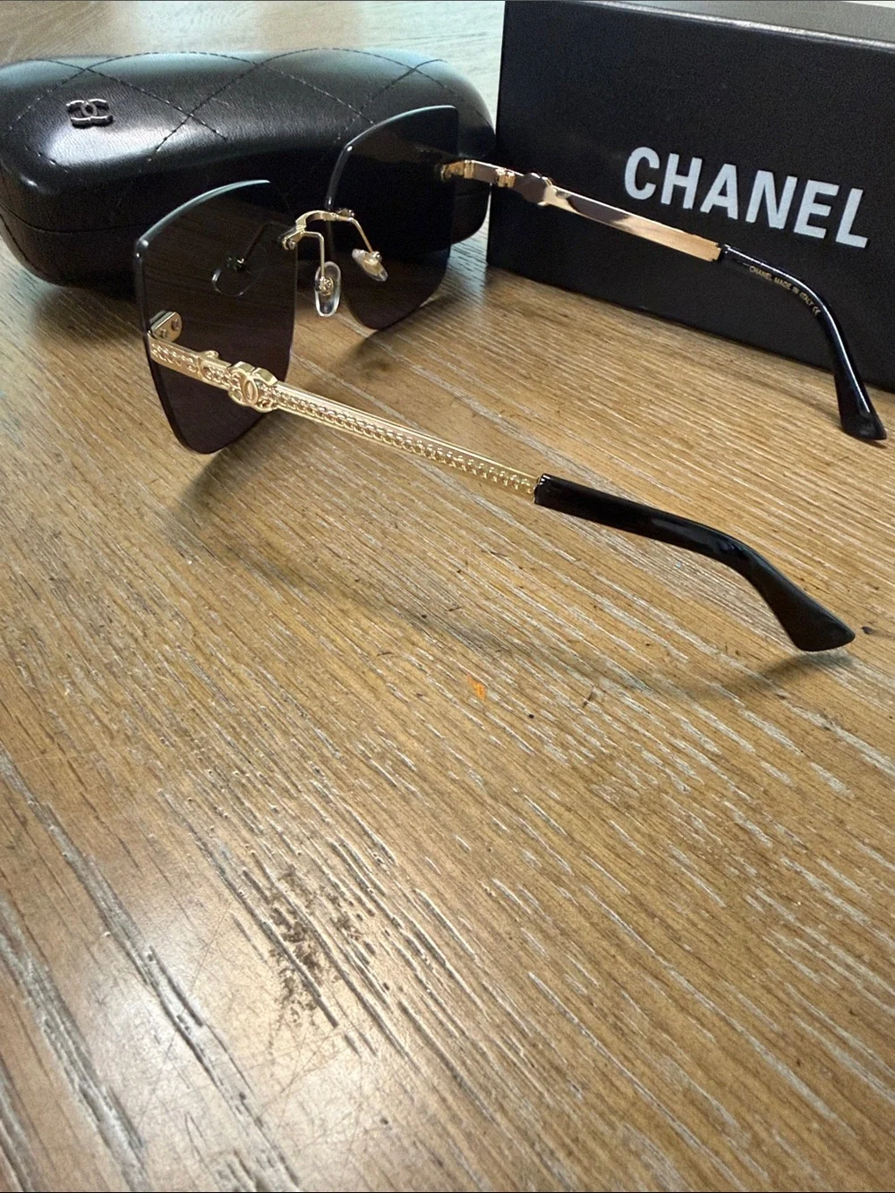 CHANEL Rimless Square Sunglasses with Dark Gradient Lenses and Gold Accents
